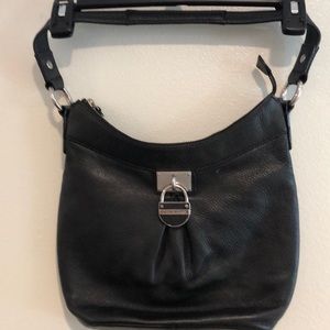 CALVIN KLEIN Black leather purse, great condition pocket on the outside for phon